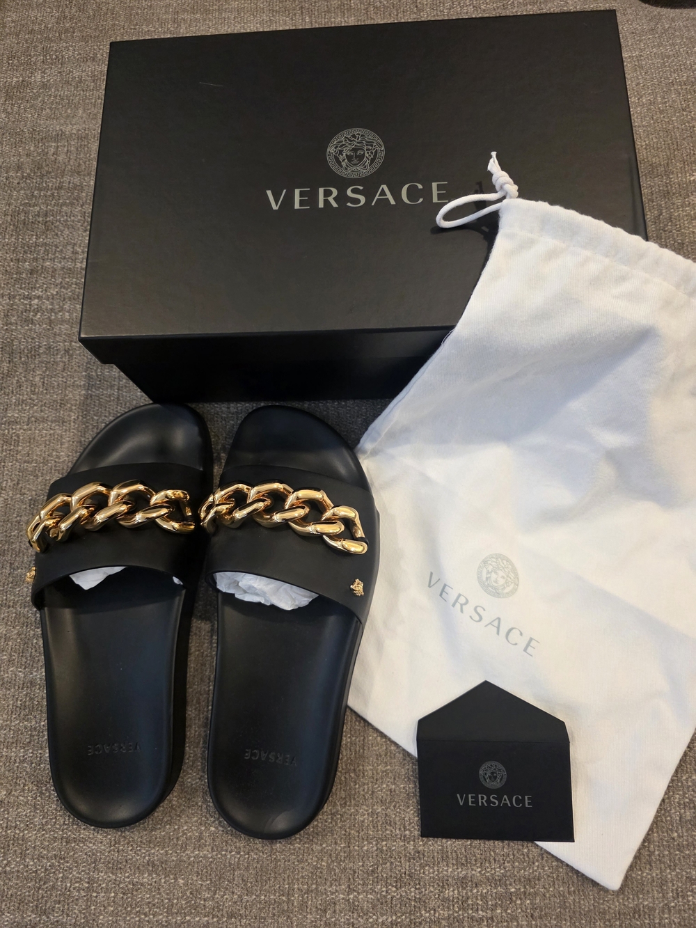 Versace Black Slide Sandals with Bold Gold Chain